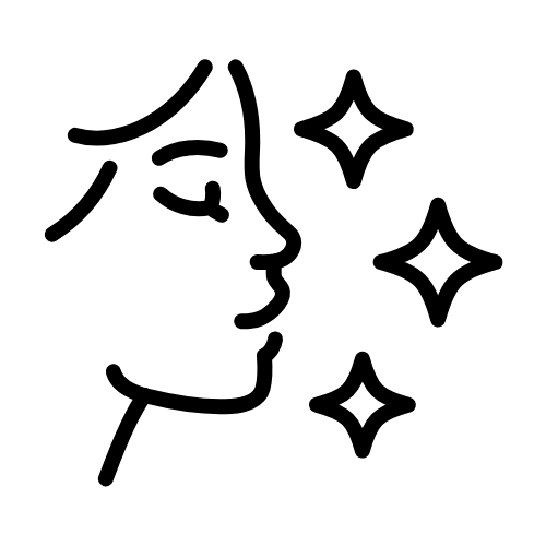 Side profile of a face with three sparkle icons representing glowing skin